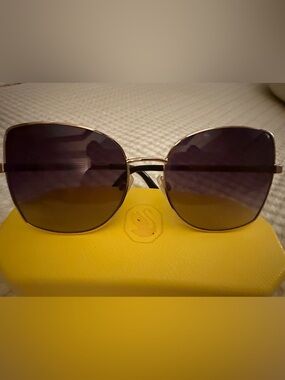 Swarovski Gold Frame Sunglasses gold frame with Swarovski crystals in the temple